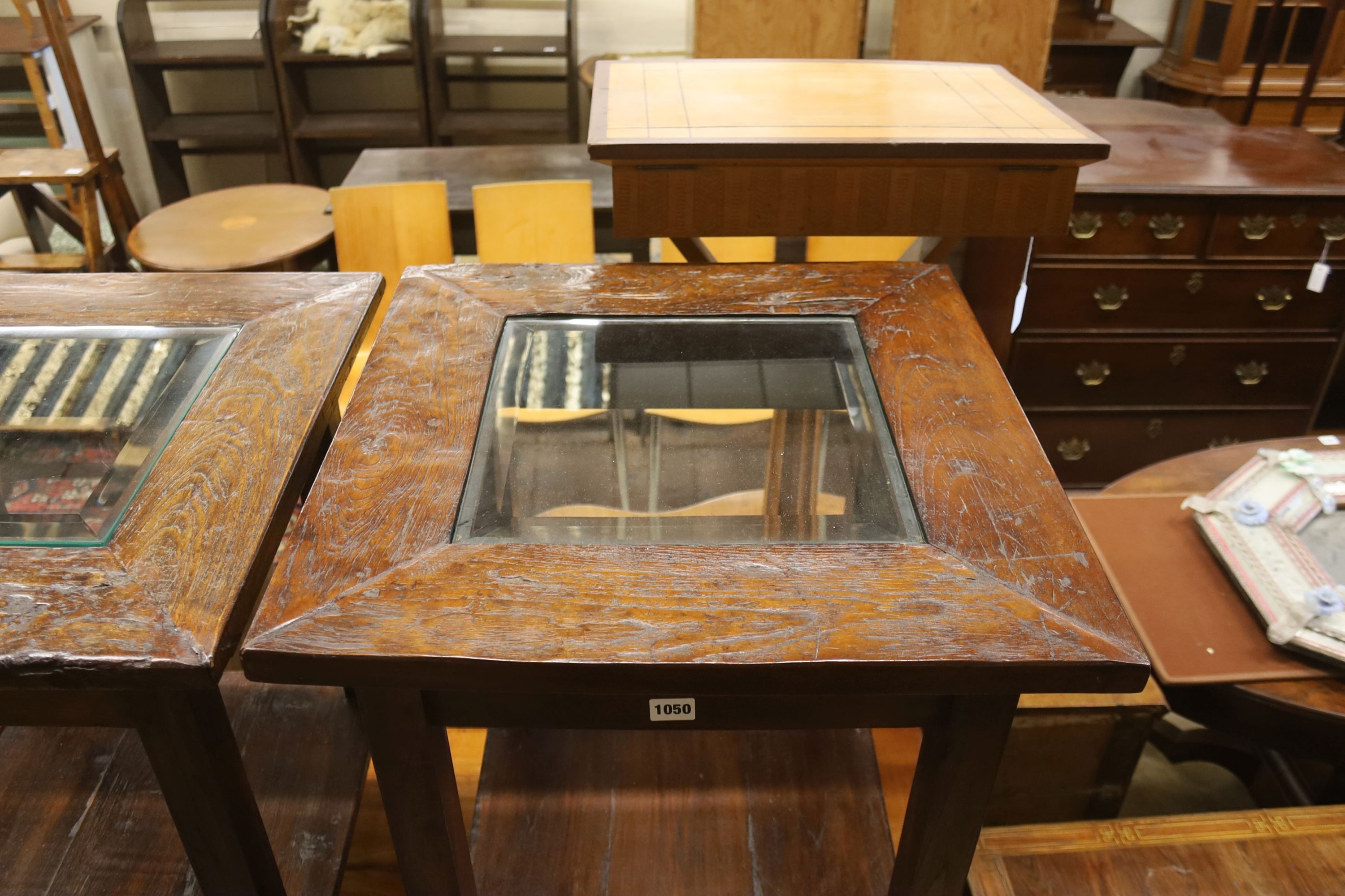 A pair of square glazed hardwood occasional tables, width 55cm, height 70cm